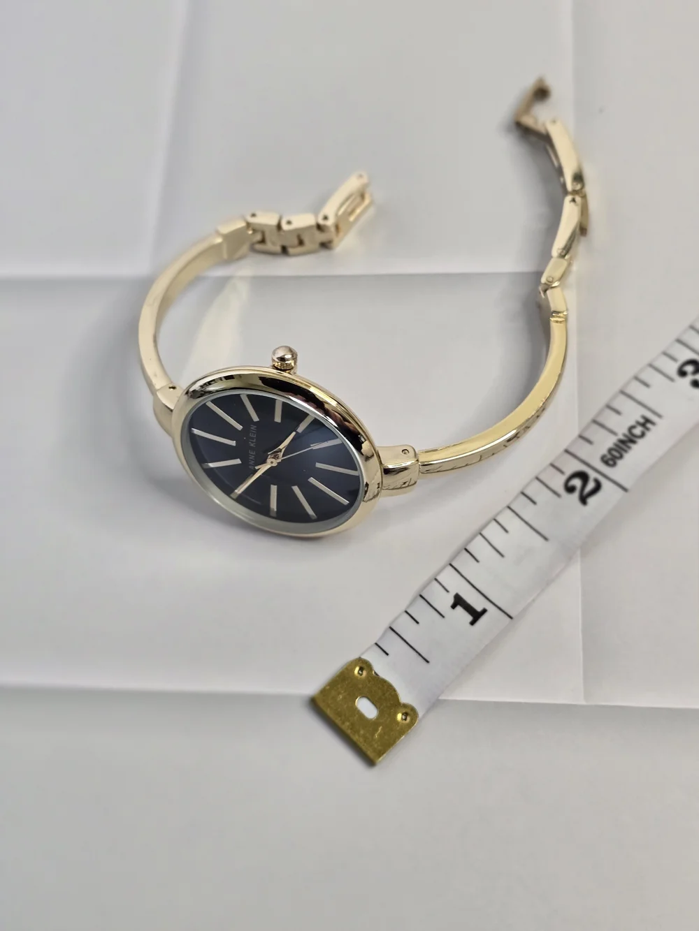 Anne Klein Gold and Black Slim Bangle Watch